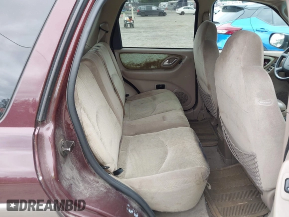 2001 Mazda Tribute LX with VIN 4F2CU08141KM10269, listed as a IAAI auction lot 42138704 with 166,825 mi miles and . Bid and sale history available at carsss.com. Image 8.