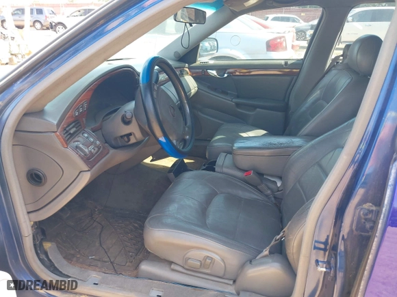 2005 Cadillac DeVille with VIN 1G6KD54Y95U214904, listed as a IAAI auction lot 42014527 with 144,207 mi miles. Bid and sale history available at carsss.com. Image 5.