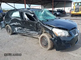2010 Pontiac Vibe 1SA z VIN 5Y2SP6E80AZ417279, wystawiony jako IAAI lot #41029040 z przebiegiem 150 087 mil mil oraz . Historia ofert i sprzedaży dostępna na DreamBid. Obrazek 1.