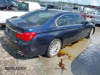 2012 BMW 7 Series 750Li with VIN WBAKB8C50CC963425, listed as a IAAI auction lot 42543576 with 132,054 mi miles and . Bid and sale history available at DreamBid. Image 4.