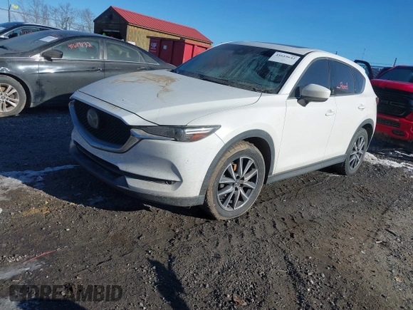 2017 Mazda CX-5 Grand Touring with VIN JM3KFBDL2H0171021, listed as a IAAI auction lot 41619642 with 67,581 mi miles. Bid and sale history available at carsss.com. Image 2.