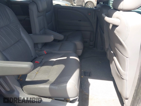 2010 Honda Odyssey EX-L with VIN 5FNRL3H73AB107662, listed as a IAAI auction lot 42107166 with 188,308 mi miles. Bid and sale history available at carsss.com. Image 8.