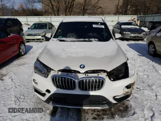 2017 BMW X1 xDrive28i with VIN WBXHT3C33H5F77000, listed as a Copart auction lot 41860993 with 113,553 mi miles. Bid and sale history available at carsss.com. Image 5.