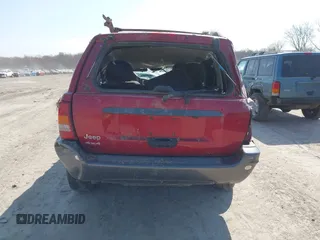 2004 Jeep Grand Cherokee Laredo z VIN 1J4GW48S34C289321, wystawiony jako IAAI lot #42062819 z przebiegiem Nie podano mil oraz . Historia ofert i sprzedaży dostępna na DreamBid. Obrazek 16.