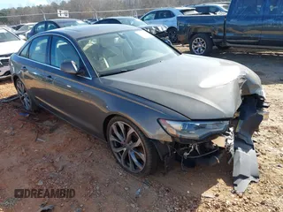 2014 Audi A6 Premium Plus z VIN WAUDFAFC7EN087684, wystawiony jako IAAI lot #41409408 z przebiegiem 69 916 mil mil oraz . Historia ofert i sprzedaży dostępna na DreamBid. Obrazek 1.