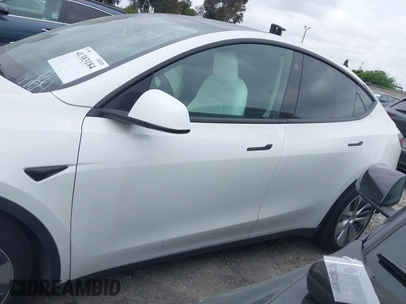 2023 Tesla Model Y Long Range z VIN 7SAYGDEE9PF623285, wystawiony jako IAAI lot #41383184 z przebiegiem 34 092 mil mil oraz . Historia ofert i sprzedaży dostępna na DreamBid. Obrazek 14.