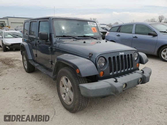 2007 Jeep Wrangler Unlimited Sahara z VIN 1J4GB59147L165439, wystawiony jako Copart lot #50794065 z przebiegiem 255 385 mil mil oraz Szkoda całkowita • Salvage title. Historia ofert i sprzedaży dostępna na DreamBid. Obrazek 4.