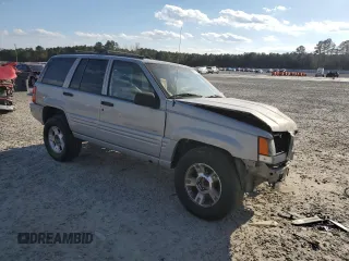 1998 Jeep Grand Cherokee with VIN 1J4GX48Y7WC216585, listed as a Copart auction lot 83532184 with 144,739 mi miles and Salvage title. Bid and sale history available at DreamBid. Image 4.