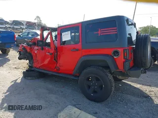 2015 Jeep Wrangler Unlimited Sport with VIN 1C4BJWDG4FL694005, listed as a IAAI auction lot 41971529 with Not provided miles and . Bid and sale history available at DreamBid. Image 3.