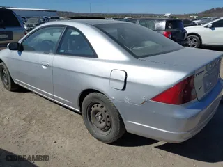 2001 Honda Civic EX with VIN 1HGEM22921L118201, listed as a IAAI auction lot 41692215 with 293,872 mi miles. Bid and sale history available at carsss.com. Image 3.