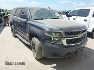 2017 Chevrolet Tahoe Commercial z VIN 1GNLCDEC4HR310570, wystawiony jako IAAI lot #42416737 z przebiegiem 92 000 mil mil oraz . Historia ofert i sprzedaży dostępna na DreamBid. Obrazek 1.