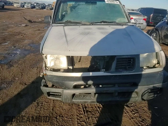 1999 Nissan Frontier XE with VIN 1N6DD21S4XC341893, listed as a Copart auction lot 42508815 with 86,040 mi miles and Salvage title. Bid and sale history available at DreamBid. Image 10.