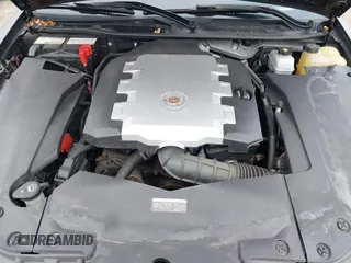 2009 Cadillac STS AWD z VIN 1G6DD67V290140111, wystawiony jako IAAI lot #41800236 z przebiegiem 81 913 mil mil oraz . Historia ofert i sprzedaży dostępna na DreamBid. Obrazek 10.
