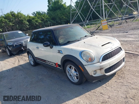 2007 MINI Hardtop S z VIN WMWMF73567TL88079, wystawiony jako IAAI lot #42820770 z przebiegiem Nie podano mil oraz . Historia ofert i sprzedaży dostępna na DreamBid. Obrazek 1.