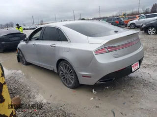 2013 Lincoln MKZ with VIN 3LN6L2J91DR819949, listed as a IAAI auction lot 41142308 with 156,244 mi miles. Bid and sale history available at carsss.com. Image 3.