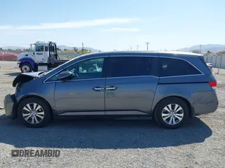 2014 Honda Odyssey EX-L with VIN 5FNRL5H67EB096027, listed as a IAAI auction lot 41950398 with 147,158 mi miles and . Bid and sale history available at DreamBid. Image 14.