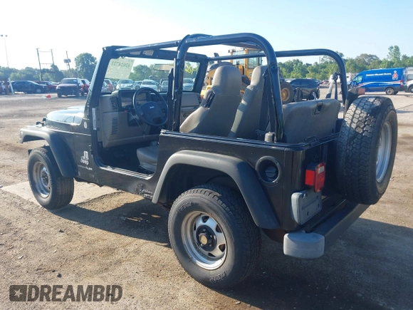 2004 Jeep Wrangler SE with VIN 1J4FA29144P797861, listed as a IAAI auction lot 42624721 with 156,867 mi miles and . Bid and sale history available at DreamBid. Image 3.