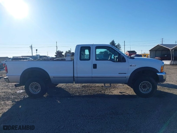 1999 Ford Super Duty F-250 XL with VIN 1FTNX21F4XED35890, listed as a IAAI auction lot 41420623 with 214,432 mi miles. Bid and sale history available at carsss.com. Image 13.