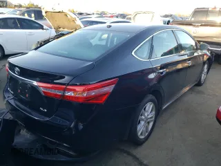 2015 Toyota Avalon Limited with VIN 4T1BK1EB4FU174220, listed as a Copart auction lot 37611773 with 69,781 mi miles and . Bid and sale history available at DreamBid. Image 3.