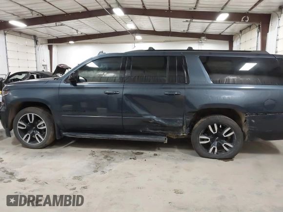 2019 Chevrolet Suburban Premier with VIN 1GNSKJKJ8KR169252, listed as a IAAI auction lot 41472231 with 95,266 mi miles and . Bid and sale history available at DreamBid. Image 14.