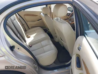 2005 Jaguar S-Type with VIN SAJWA01T95FN22745, listed as a IAAI auction lot 41898269 with 57,614 mi miles and . Bid and sale history available at DreamBid. Image 8.