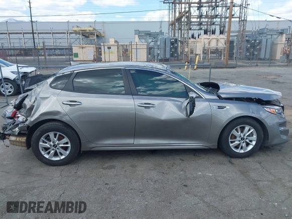 2018 Kia Optima LX z VIN 5XXGT4L38JG228380, wystawiony jako IAAI lot #41960308 z przebiegiem 43 317 mil mil oraz . Historia ofert i sprzedaży dostępna na DreamBid. Obrazek 13.