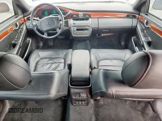 2004 Cadillac DeVille z VIN 1G6KD54Y04U111840, wystawiony jako Copart lot #56712195 z przebiegiem 60 378 mil mil oraz Szkody całkowita. Historia ofert i sprzedaży dostępna na DreamBid. Obrazek 8.