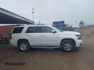 2015 Chevrolet Tahoe LTZ with VIN 1GNSCCKC1FR265370, listed as a IAAI auction lot 42131294 with 217,064 mi miles and . Bid and sale history available at DreamBid. Image 13.