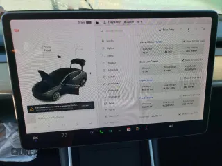 2019 Tesla Model 3 Mid Range with VIN 5YJ3E1EA6KF436152, listed as a Copart auction lot 50399265 with 62,676 mi miles and Salvage Title. Bid and sale history available at DreamBid. Image 9.
