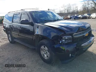 2014 Chevrolet Suburban LT with VIN 1GNSKJE71ER232700, listed as a IAAI auction lot 40812602 with 245,852 mi miles and . Bid and sale history available at DreamBid. Image 1.