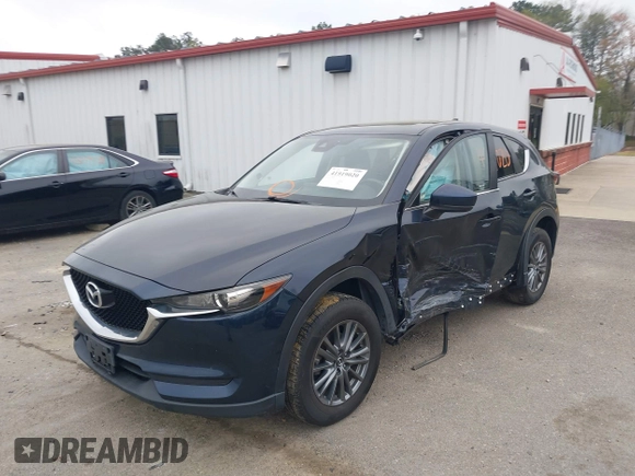 2017 Mazda CX-5 Touring with VIN JM3KFBCL9H0163449, listed as a IAAI auction lot 41919020 with 102,898 mi miles. Bid and sale history available at carsss.com. Image 17.