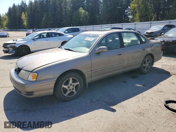 1998 Toyota Avalon XL with VIN 4T1BF18BXWU228989, listed as a Copart auction lot 53821495 with 157,209 mi miles and Salvage Title. Bid and sale history available at DreamBid. Image 1.