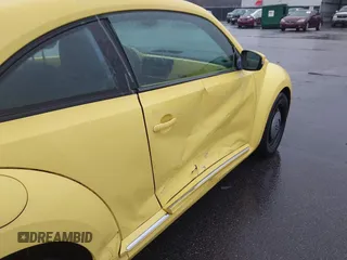 2013 Volkswagen Beetle 2.5L with VIN 3VWHX7AT7DM613197, listed as a IAAI auction lot 41298890 with 130,219 mi miles and . Bid and sale history available at DreamBid. Image 18.