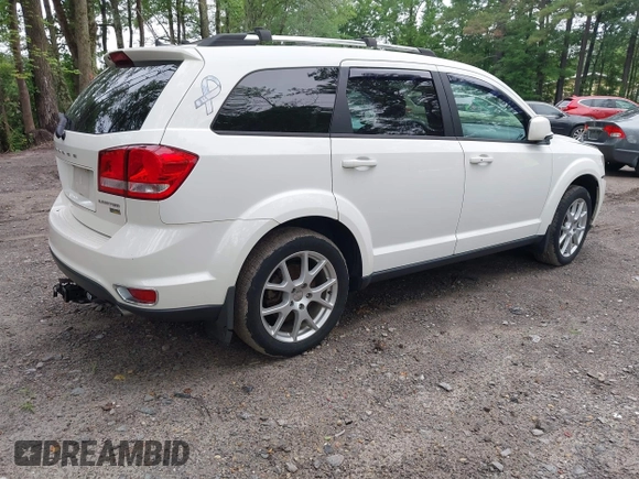 2015 Dodge Journey SXT with VIN 3C4PDCCG2FT690956, listed as a IAAI auction lot 42515701 with 145,676 mi miles and . Bid and sale history available at DreamBid. Image 4.