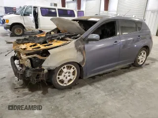 2009 Pontiac Vibe with VIN 5Y2SM67039Z411455, listed as a Copart auction lot 77417404 with Not Provided miles and Salvage Title. Bid and sale history available at carsss.com. Image 1.