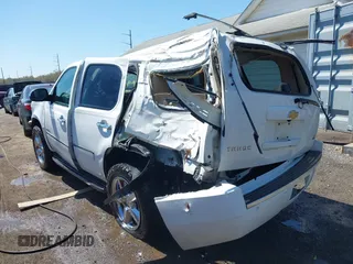2013 Chevrolet Tahoe LTZ with VIN 1GNSKCE08DR161606, listed as a IAAI auction lot 41984912 with 189,181 mi miles and . Bid and sale history available at DreamBid. Image 3.