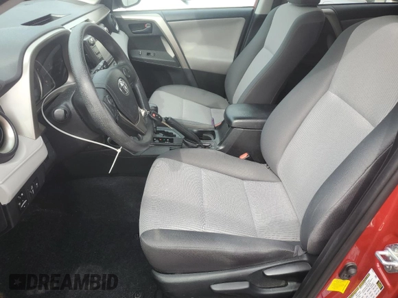 2014 Toyota RAV4 LE with VIN 2T3BFREV9EW166701, listed as a Copart auction lot 56464145 with 215,644 mi miles and Salvage Title. Bid and sale history available at DreamBid. Image 7.