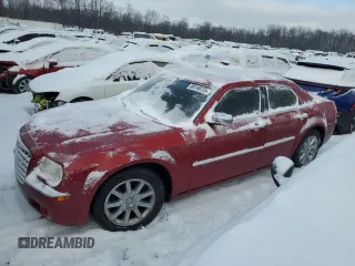 2010 Chrysler 300 with VIN 2C3CA6CT3AH250191, listed as a Copart auction lot 88148225 with 215,010 mi miles and Salvage Title. Bid and sale history available at carsss.com. Image 1.