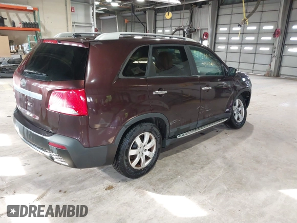2012 Kia Sorento LX with VIN 5XYKTCA66CG264679, listed as a IAAI auction lot 41742682 with 161,781 mi miles. Bid and sale history available at carsss.com. Image 4.