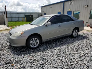 2005 Toyota Camry LE with VIN 4T1BE30K75U544259, listed as a Copart auction lot 61448175 with 219,869 mi miles and Salvage title. Bid and sale history available at DreamBid. Image 1.