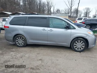 2012 Toyota Sienna XLE with VIN 5TDDK3DC7CS037579, listed as a IAAI auction lot 41080620 with 158,843 mi miles. Bid and sale history available at carsss.com. Image 14.