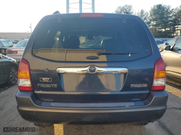 2003 Mazda Tribute ES with VIN 4F2CZ961X3KM46219, listed as a Copart auction lot 84234844 with 194,241 mi miles and Salvage Title. Bid and sale history available at carsss.com. Image 6.