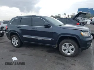 2013 Jeep Grand Cherokee Laredo with VIN 1C4RJEAGXDC620968, listed as a IAAI auction lot 41425270 with 127,739 mi miles. Bid and sale history available at carsss.com. Image 13.