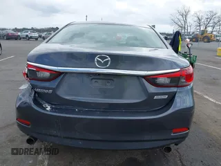 2014 Mazda 6 i Sport with VIN JM1GJ1U51E1111018, listed as a IAAI auction lot 41875461 with 253,755 mi miles and . Bid and sale history available at DreamBid. Image 16.