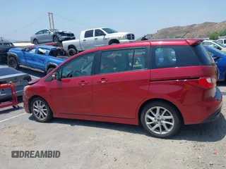 2015 Mazda 5 Grand Touring with VIN JM1CW2DL6F0190312, listed as a IAAI auction lot 42433782 with 79,140 mi miles and . Bid and sale history available at DreamBid. Image 14.