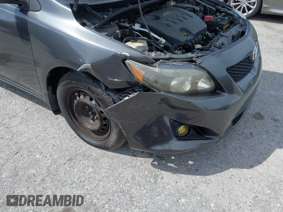 2010 Toyota Corolla with VIN 1NXBU4EE7AZ237289, listed as a IAAI auction lot 41877935 with 198,861 mi miles. Bid and sale history available at carsss.com. Image 6.