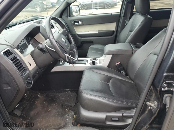 2009 Mercury Mariner Premier with VIN 4M2CU97G39KJ23120, listed as a Copart auction lot 74770224 with 143,893 mi miles and Clean Title. Bid and sale history available at carsss.com. Image 7.