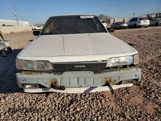 1989 Toyota Camry z VIN 4T1SV24E5KU019985, wystawiony jako Copart lot #81200104 z przebiegiem 207 103 mil mil oraz Szkoda całkowita • Salvage title. Historia ofert i sprzedaży dostępna na DreamBid. Obrazek 5.
