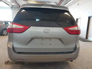 2015 Toyota Sienna XLE with VIN 5TDYK3DCXFS534633, listed as a IAAI auction lot 42018593 with 128,421 mi miles. Bid and sale history available at carsss.com. Image 16.