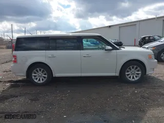 2010 Ford Flex SEL with VIN 2FMGK5CC1ABD00833, listed as a IAAI auction lot 41694538 with 143,018 mi miles. Bid and sale history available at carsss.com. Image 13.